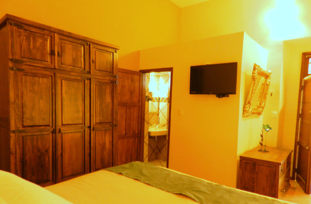 Collection O Al Otro Lado Del Rio, Puebla Hotel Exterior foto A room at the hotel