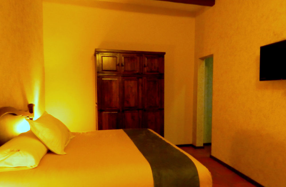 Collection O Al Otro Lado Del Rio, Puebla Hotel Exterior foto A room at the hotel