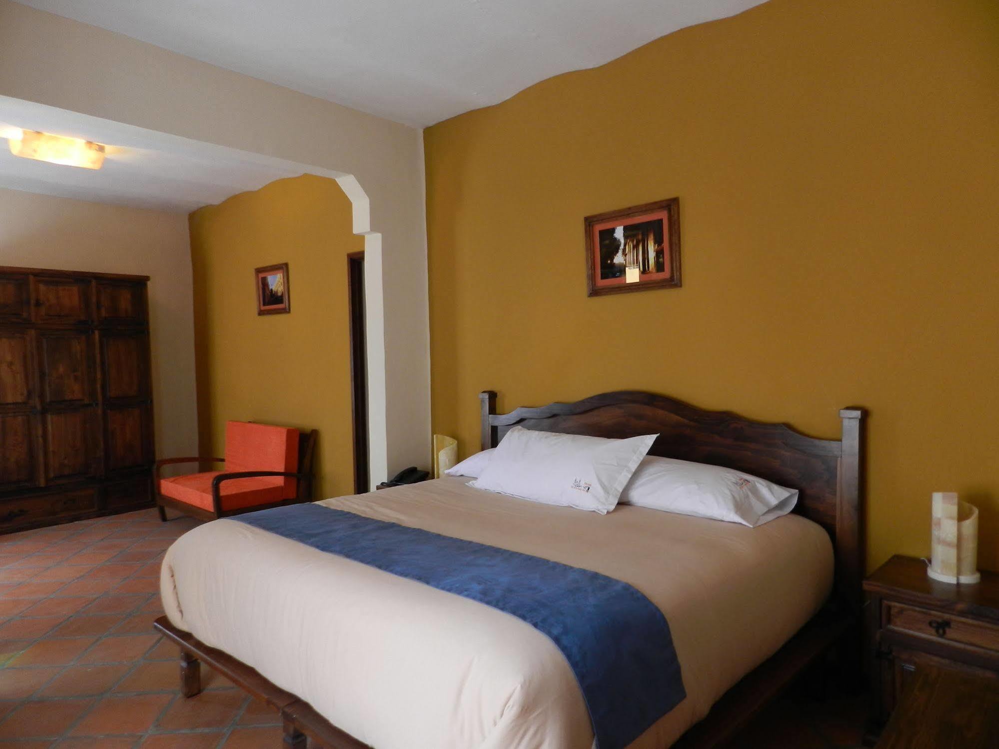 Collection O Al Otro Lado Del Rio, Puebla Hotel Exterior foto A bedroom at the hotel