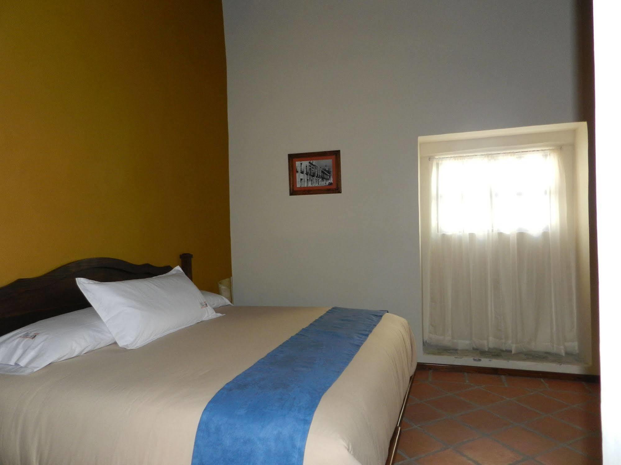 Collection O Al Otro Lado Del Rio, Puebla Hotel Exterior foto A room at the hotel