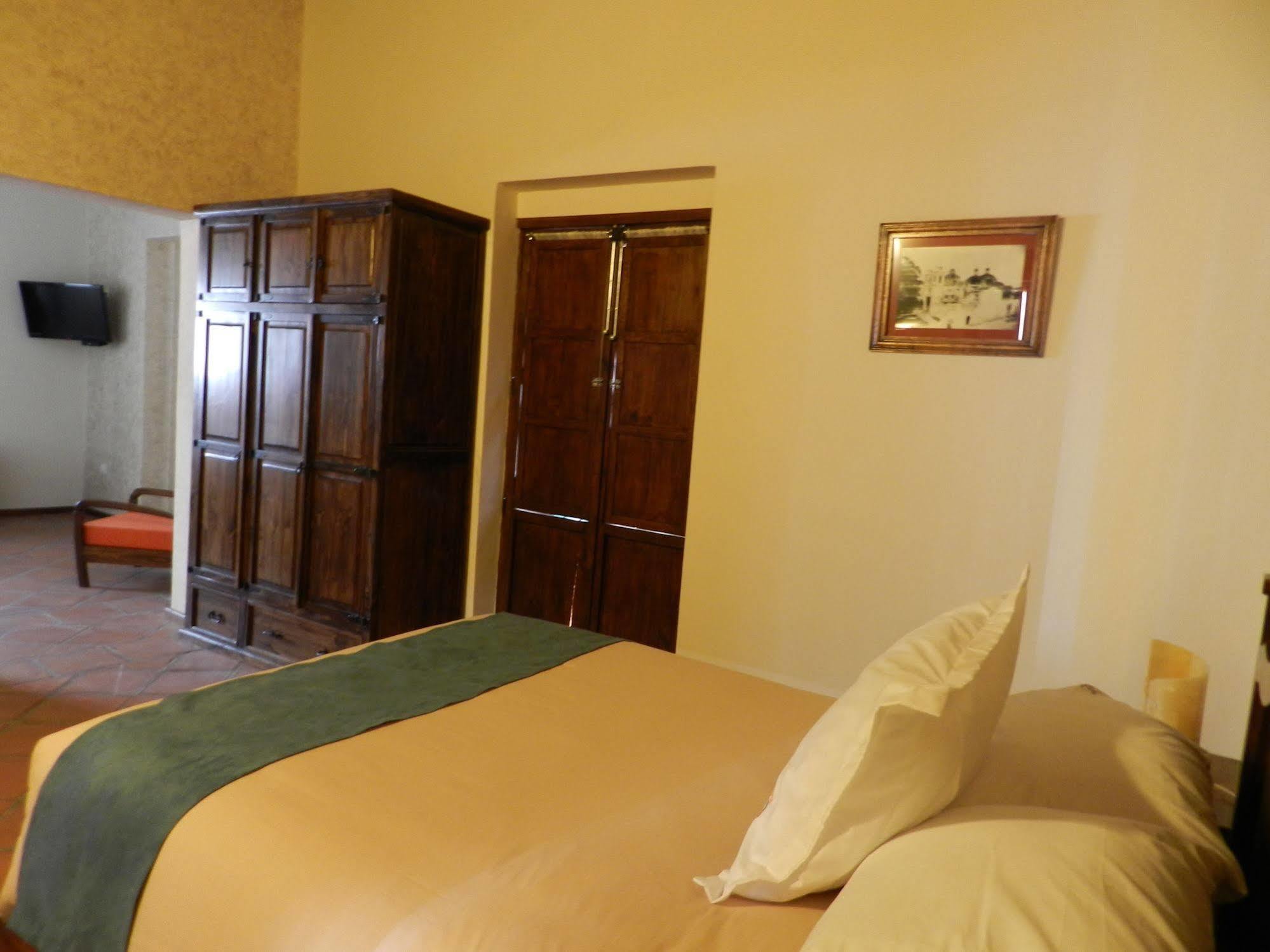 Collection O Al Otro Lado Del Rio, Puebla Hotel Exterior foto A room at the hotel