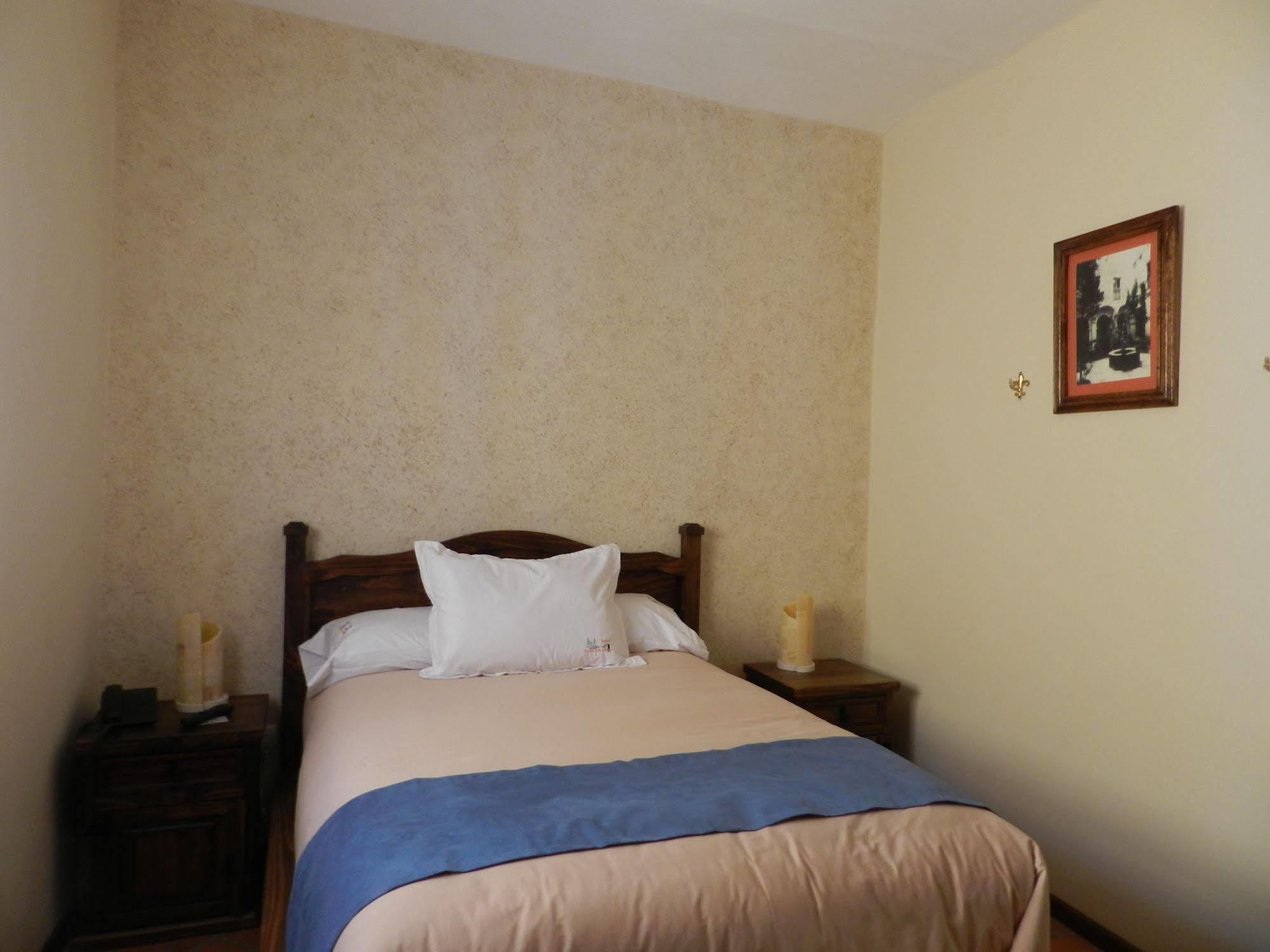 Collection O Al Otro Lado Del Rio, Puebla Hotel Exterior foto A bedroom at the hotel
