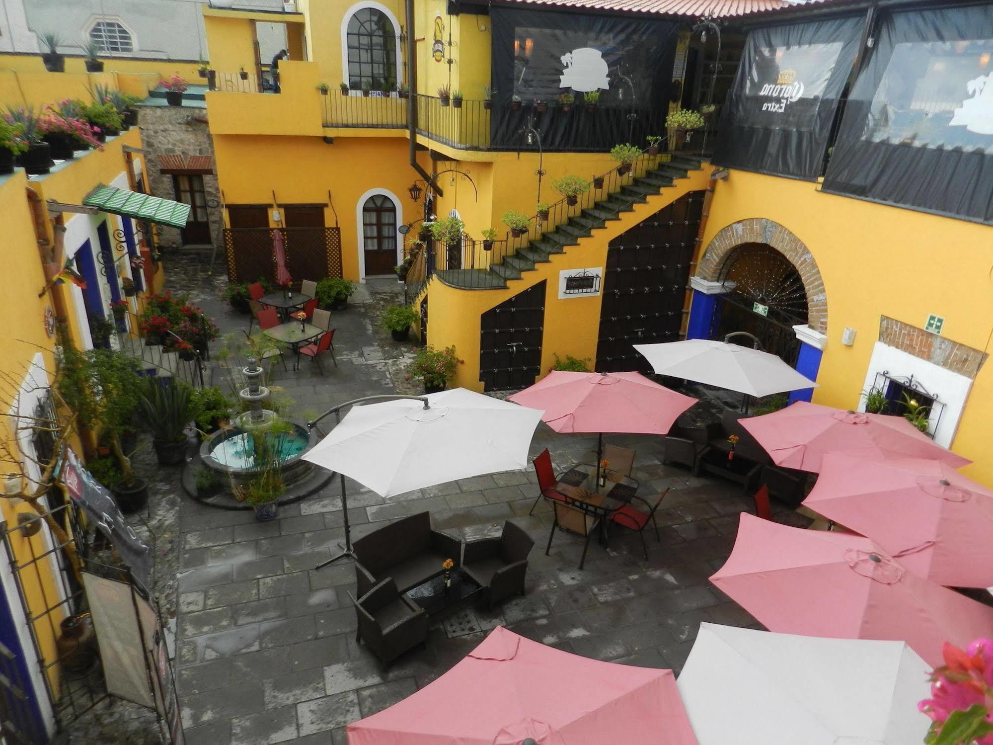Collection O Al Otro Lado Del Rio, Puebla Hotel Exterior foto Patio of the restaurant
